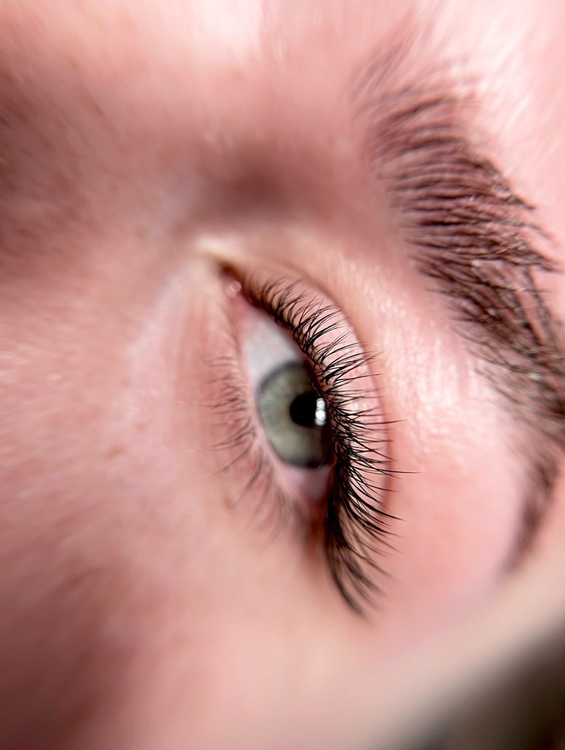 Volume lash extensions on a client at Opulence Beauty
